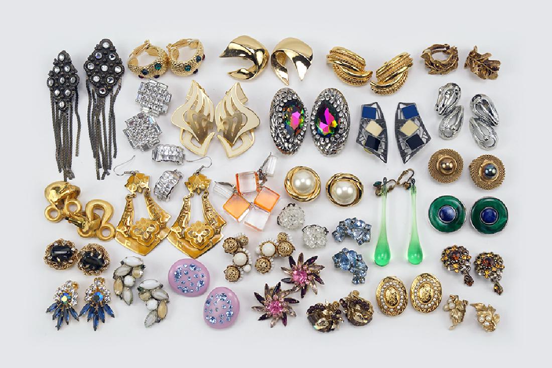 A Collection of Signed and Unsigned Earclips. (1 of 1)