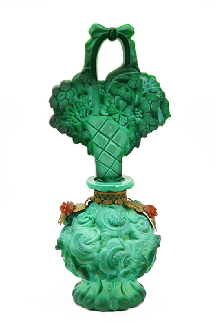 A 1930s Czechoslovakian Malachite Crystal Perfume: A 1930s Czechoslovakian Malachite Crystal Perfume Bottle. Floral bottle with openwork malachite stopper, metalwork, Bakelite roses. Marked Czechoslovakia Height: 8.5"