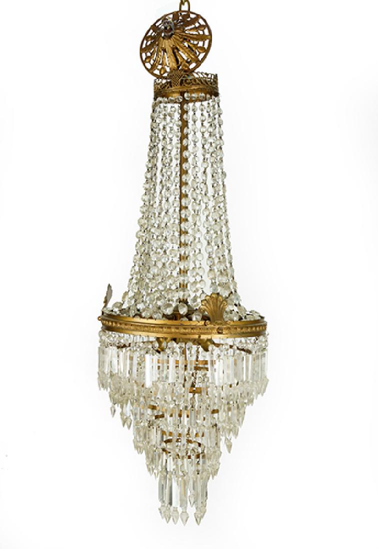 A Chandelier.: A Chandelier. Three light crystal and gilt metal hanging fixture 38" x 18"