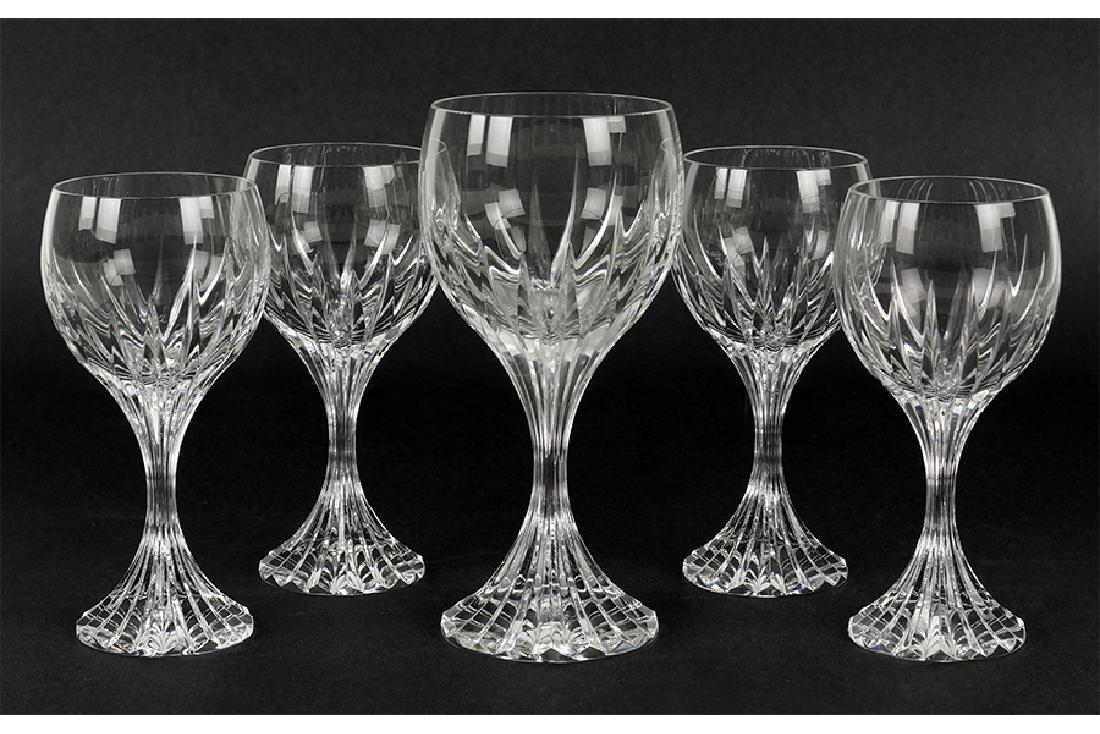 A Collection Of Baccarat Crystal Stemware.: A Collection Of Baccarat Crystal Stemware. Comprising a water goblet and four Bordeaux wine glasses in the Massena pattern Goblet: 7"