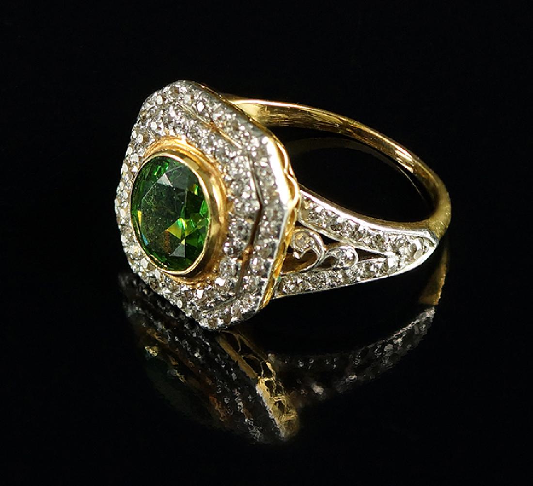 A Demantoid Garnet and Diamond Ring. (1 of 5)