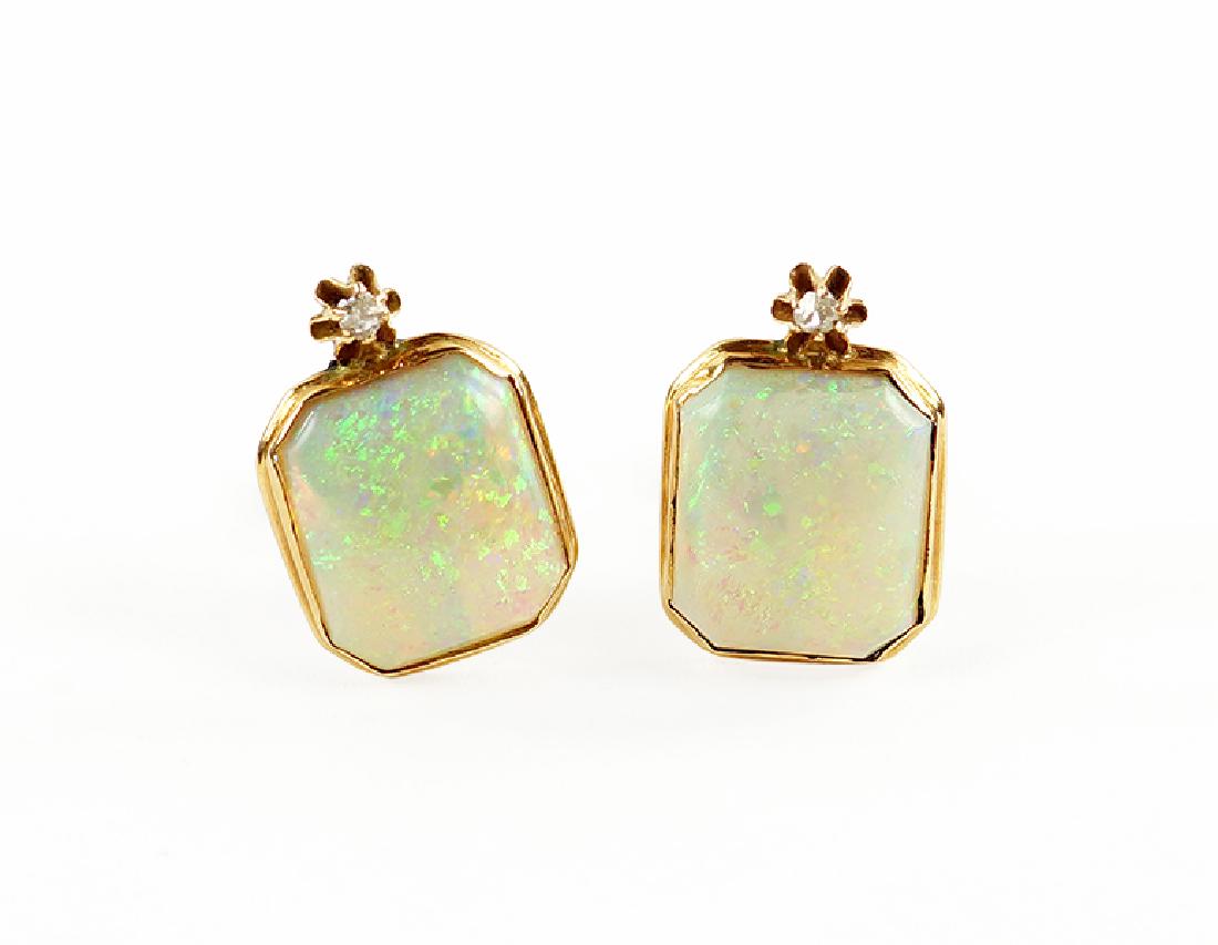 A Pair of Opal and Diamond Earclips. (1 of 1)