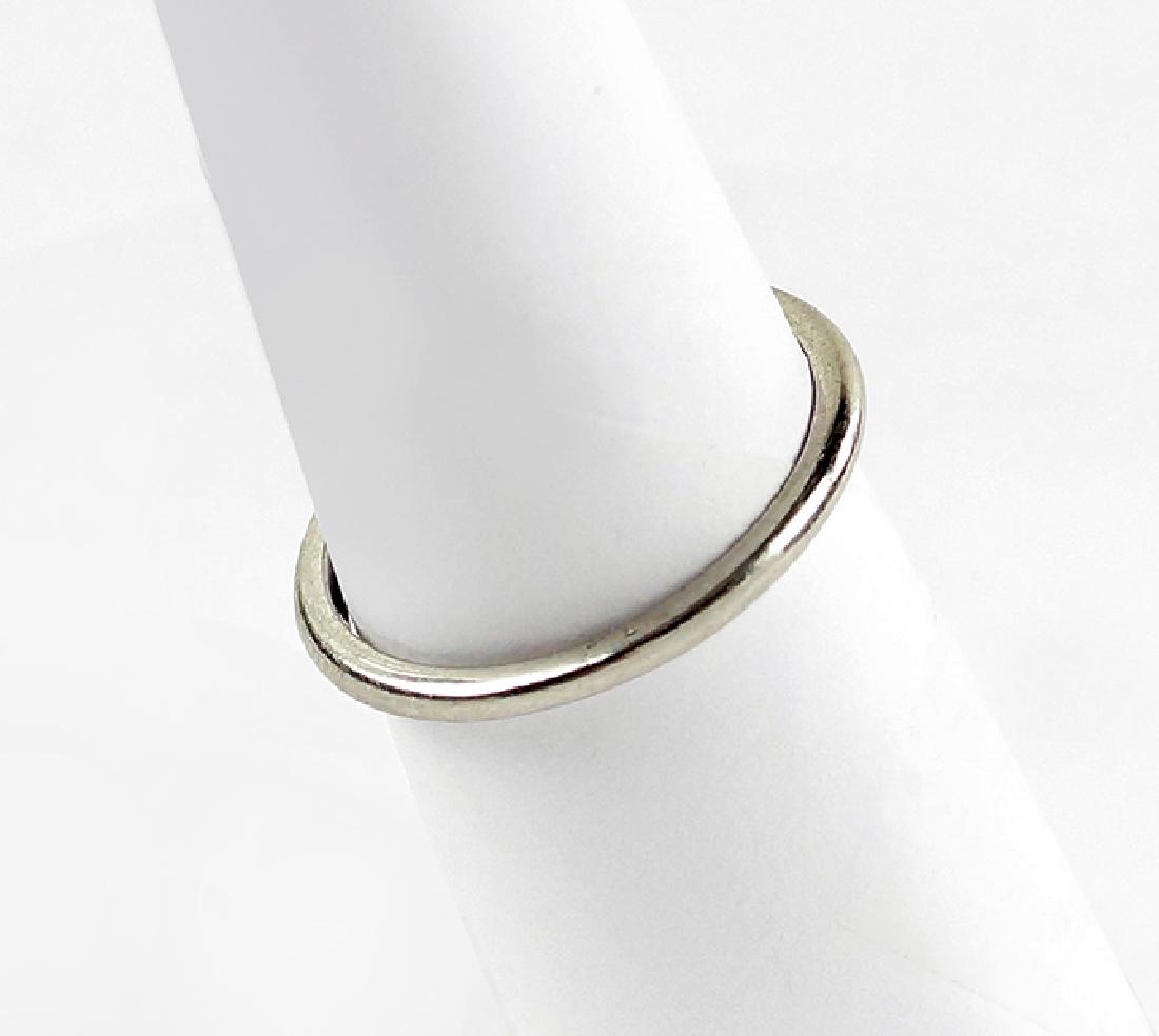 A Platinum Wedding Band.: A Platinum Wedding Band. Size: 7 Wt: 2.8 grams