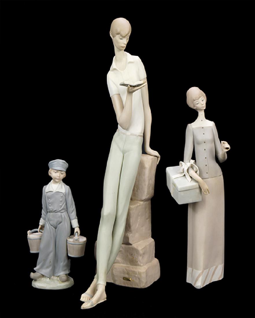 Three Lladro Matte Glazed Porcelain Figures. (1 of 1)