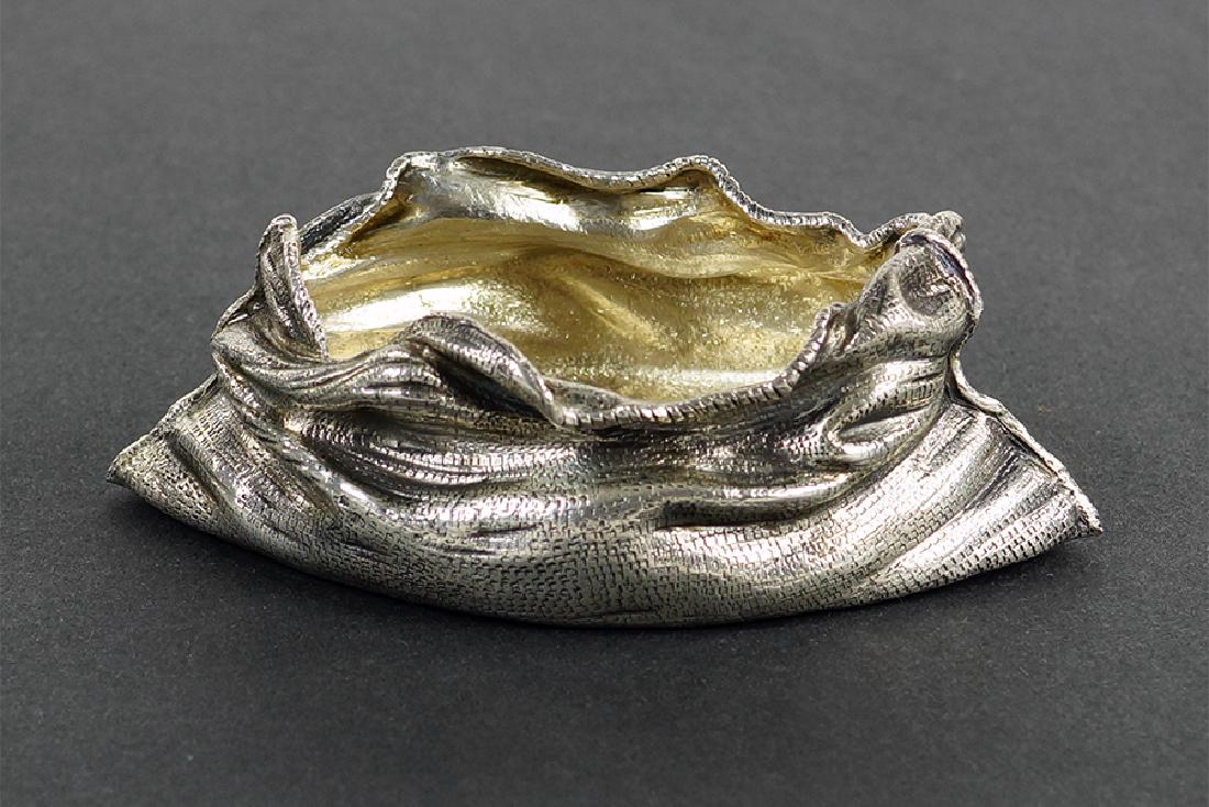 A Buccellati Sterling Silver Sack.: A Buccellati Sterling Silver Sack. Bag form sterling silver dish is stamped on the underside "Buccellati Sterling Italy" 1.5" x 4.5" x 3"