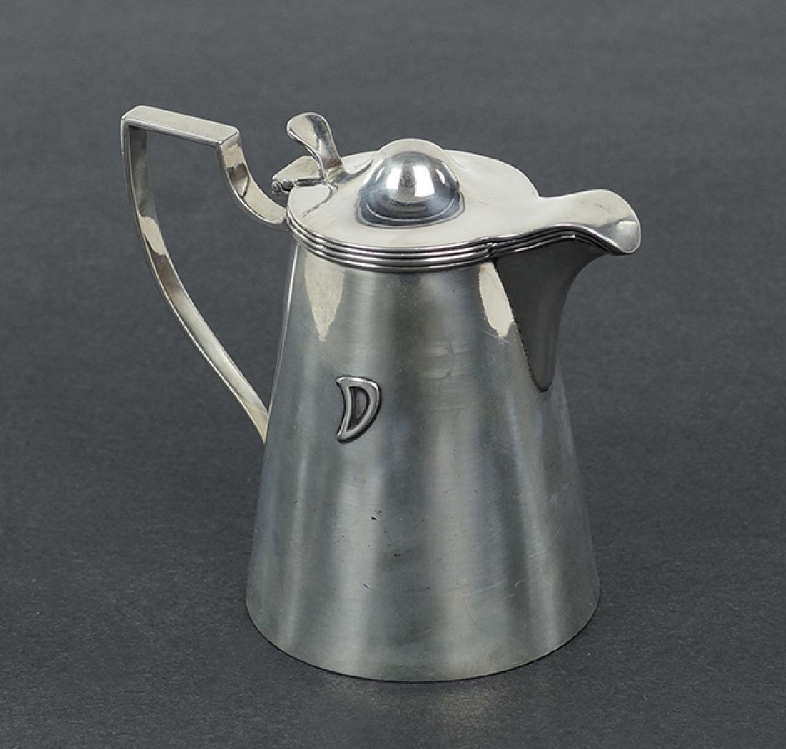 An American Sterling Silver Syrup Pitcher. (1 of 1)