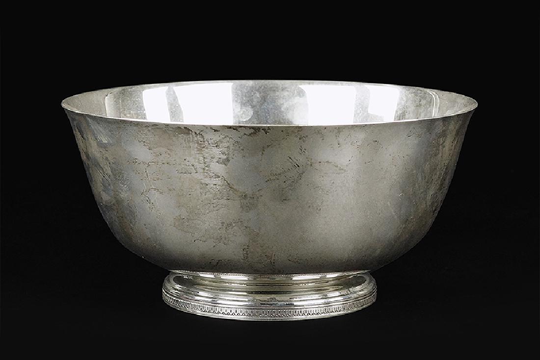 A Buccellati Sterling Silver Bowl.: A Buccellati Sterling Silver Bowl. Revere style round bowl with a decorated round base 4.5" x 9" Wt: 23.95 ozt