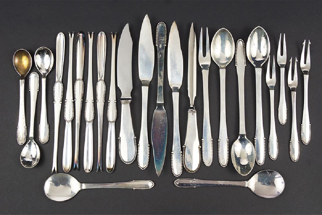 A Collection of Georg Jensen Sterling Silver Flatware. (1 of 1)