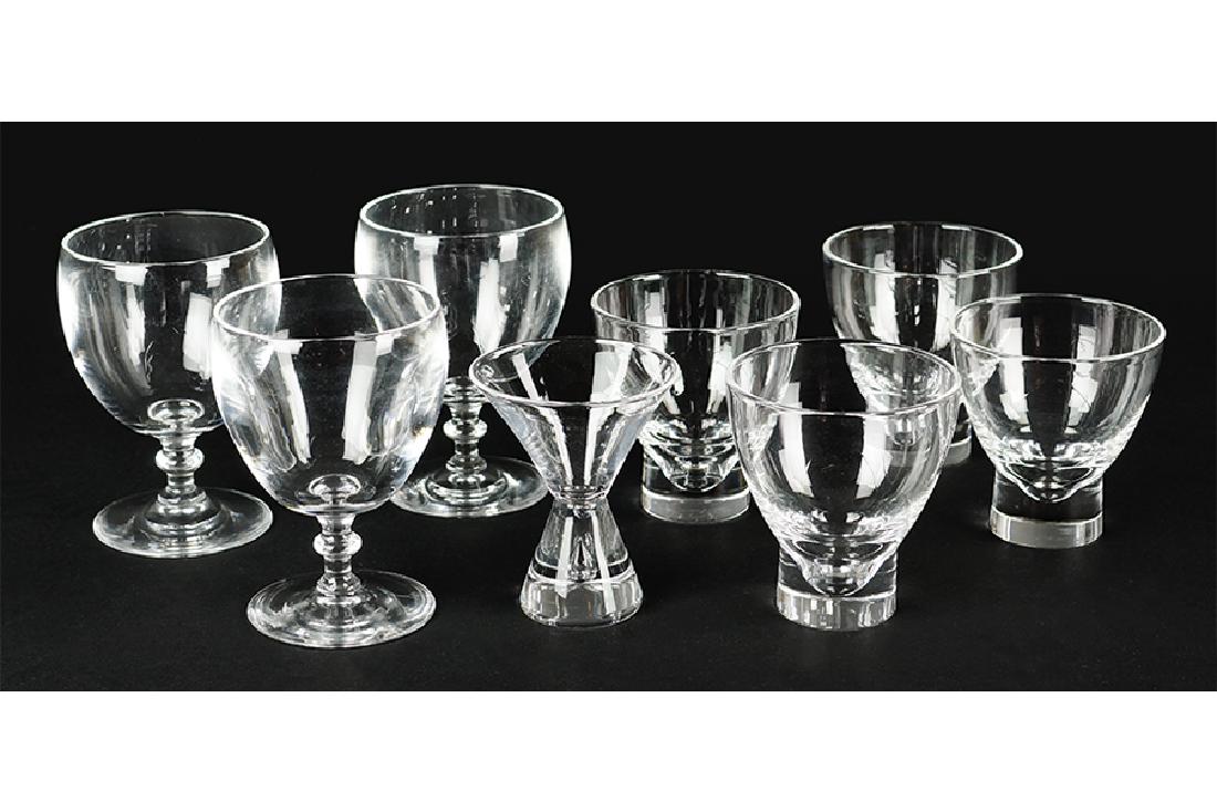 A Set Of Four Steuben Wine Glasses.: A Set Of Four Steuben Wine Glasses. Pattern #8042. Together with three Steuben water goblets, pattern #6268 and a Steuben cocktail glass, pattern #7826 Larger Glasses: 5.375"