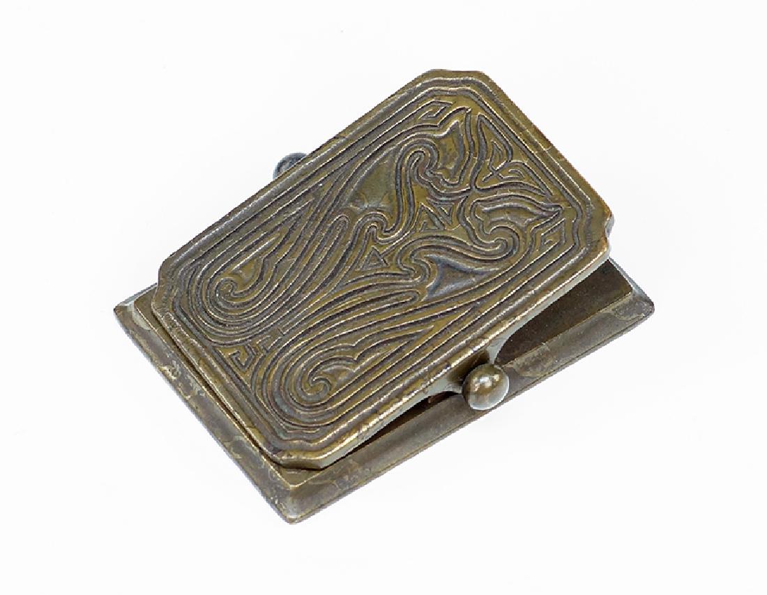 A Tiffany Studios Bronze Paper Clip in the 'Chinese' (1 of 1)