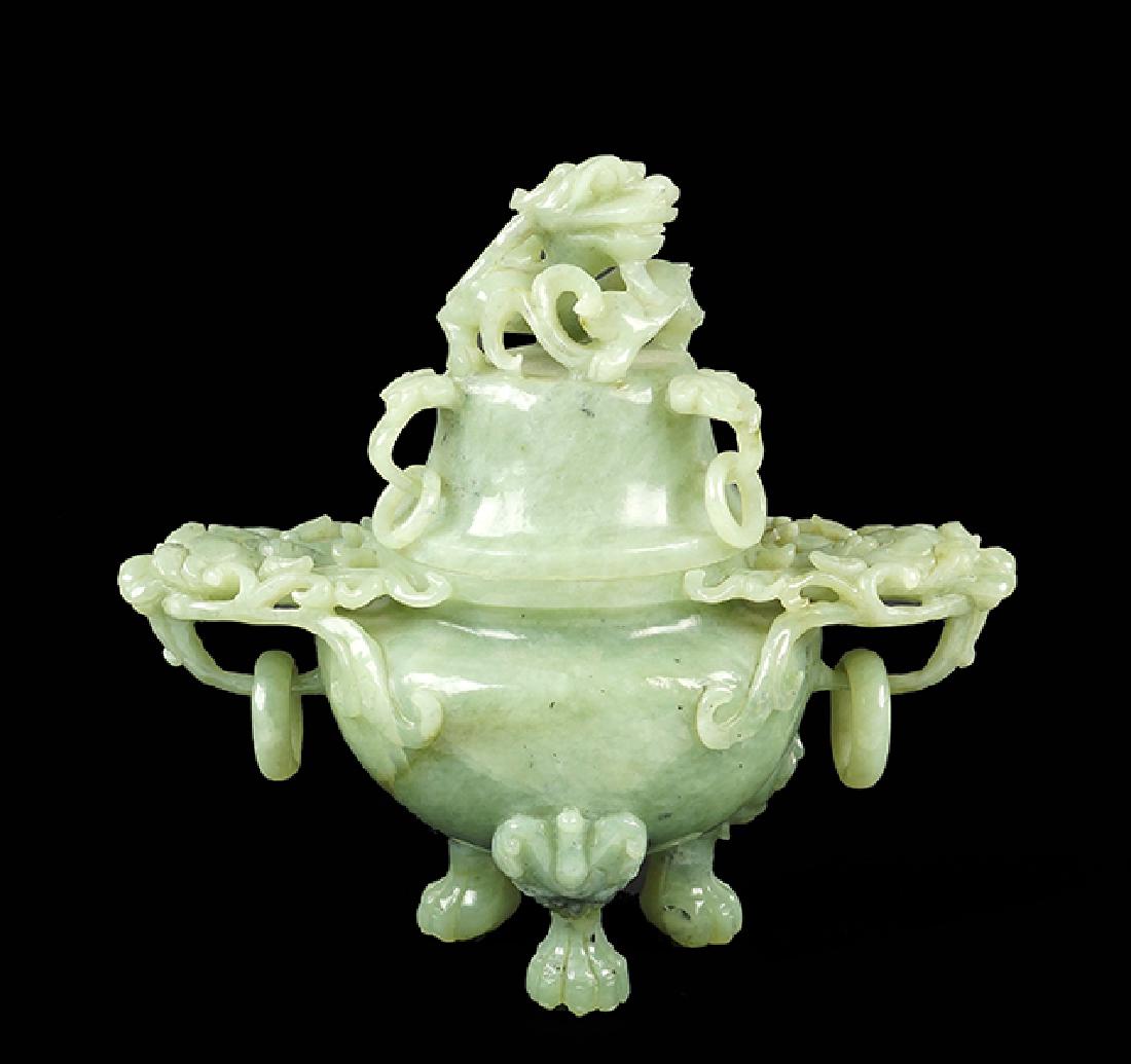 A Chinese Carved Hardstone Tripod Form Lidded Censer.: A Chinese Carved Hardstone Tripod Form Lidded Censer. In the form of dragons 8.5" x 9" x 5"