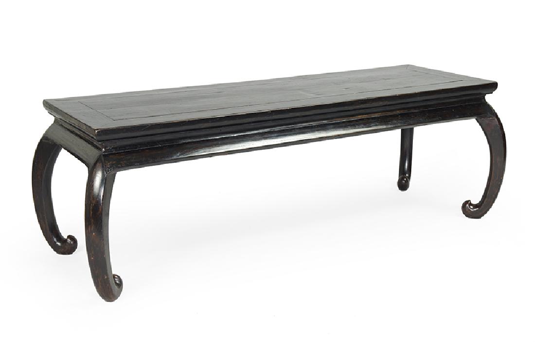 A Chinese Ebonized Wood Cocktail Table.: A Chinese Ebonized Wood Cocktail Table. 18" x 55" x 21"