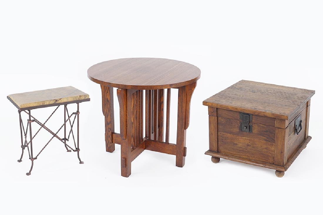 An Arts and Crafts Style Round Table.