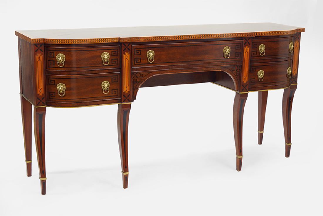 A John Widdicomb Sideboard.: A John Widdicomb Sideboard. Inlaid mahogany sideboard with one central drawer and two stacked drawers on either side 37.5" x 76" x 20.5"