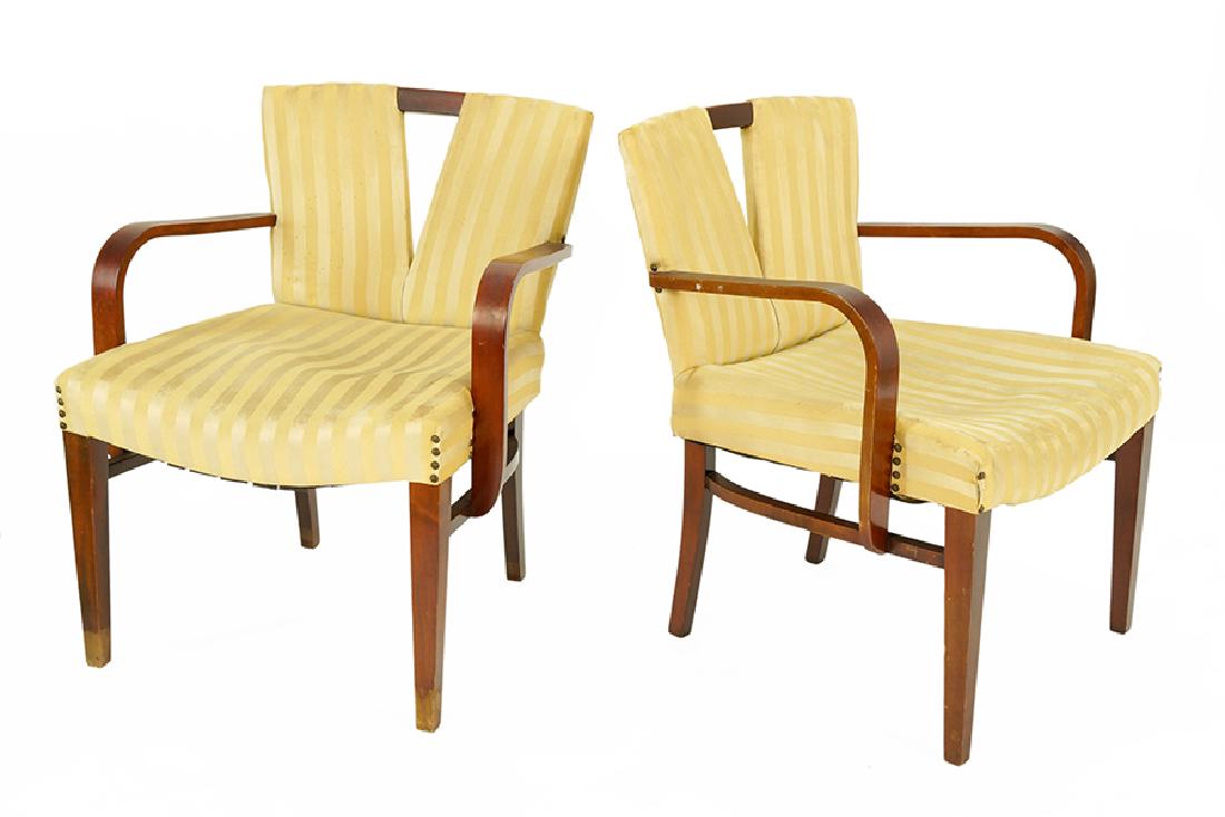 A Pair of Paul Frankl 'Corset' Chairs.: A Pair of Paul Frankl 'Corset' Chairs. Open armchairs with V form openings on the backrest 31" x 25" x 21"