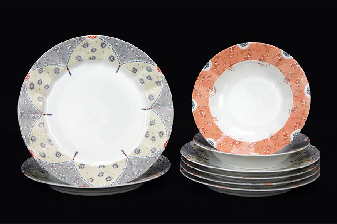 A Royal Copenhagen Porcelain Partial Table Service.: A Royal Copenhagen Porcelain Partial Table Service. Fairy Tale Grey pattern. Comprising two large dinner plates, four regular dinner plates and one soup bowl. Together with a Fairy Tale terra cotta so
