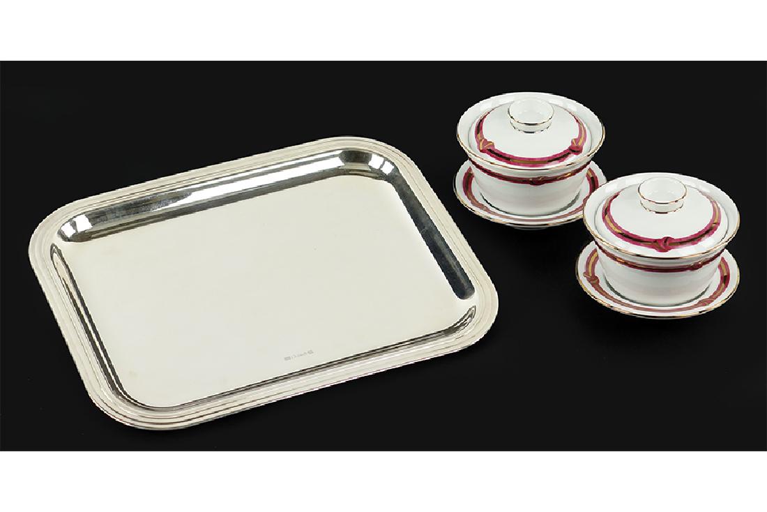A Pair of Christofle Porcelain Covered Cups and: A Pair of Christofle Porcelain Covered Cups and Saucers. Rubanea Red Knots pattern. Together with a Christofle silverplate rectangular tray (8" x 10.25")