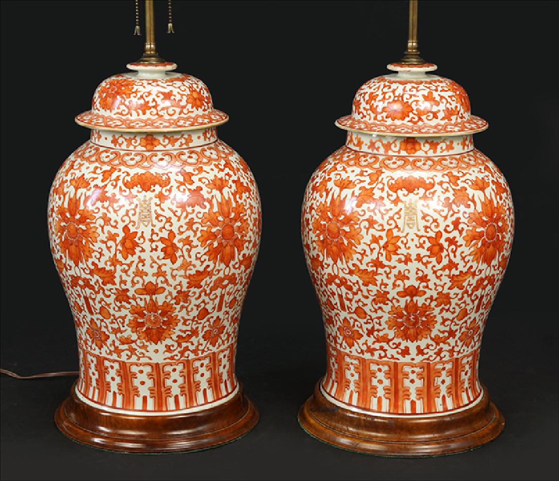 A Pair of Chinese Copper Red Ginger Jar Lamps.: A Pair of Chinese Copper Red Ginger Jar Lamps. Height to top of porcelain: 18.5"