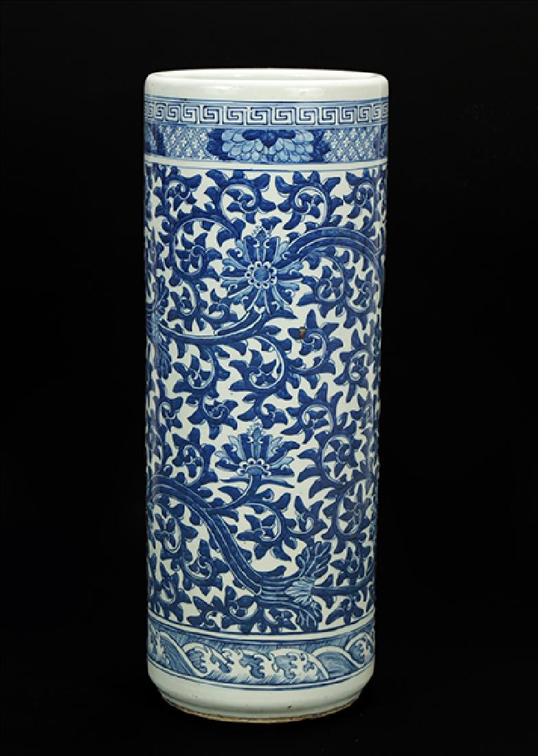 A Chinese Blue and White Porcelain Umbrella Stand.: A Chinese Blue and White Porcelain Umbrella Stand. Bearing a foliate pattern throughout, unmarked 24" x 9"
