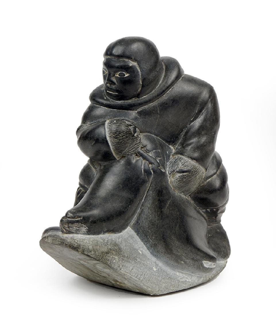 A Stone Sculpture Of An Inuit Hunting A Seal.: A Stone Sculpture Of An Inuit Hunting A Seal. Signed Noolookie 10.5" x 9" x 5.5"