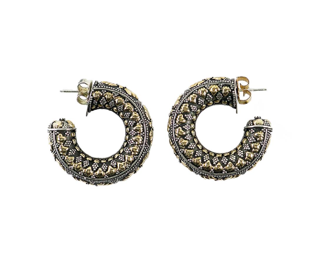 A Pair of John Hardy Hoop Earrings.: A Pair of John Hardy Hoop Earrings. Sterling silver hoop earrings decorated with 18 karat yellow gold and silver overlays 28 grams