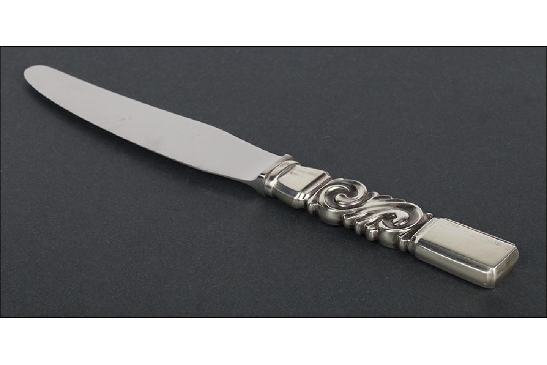 A Set of Nine Georg Jensen Sterling Silver Knives. (1 of 3)