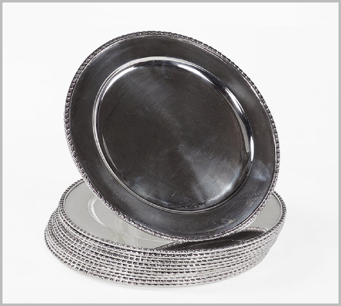 A Set of Twelve Mexican Sterling Silver Chargers. (1 of 1)