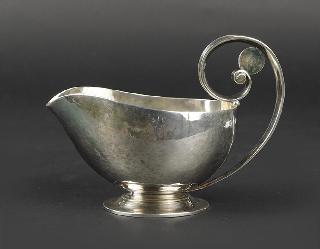 A Georg Jensen Sterling Silver Creamer. (1 of 2)