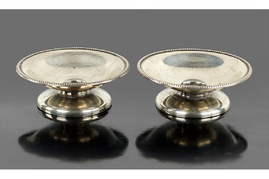 A Pair of Silver Salt Cellars.: A Pair of Silver Salt Cellars. .930 silver round footed salt cellars, possibly Norwegian 1" x 2.75" Wt: 1.45 ozt