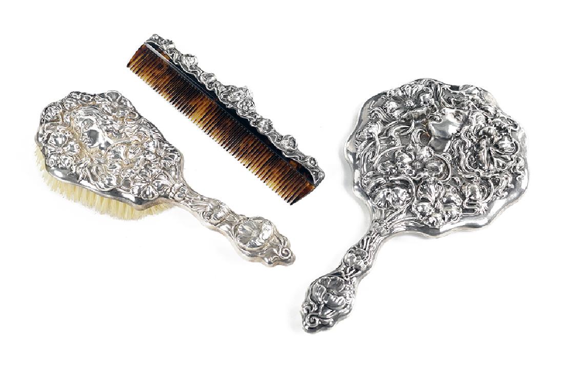 An Art Nouveau Sterling Silver Vanity Suite. (1 of 1)