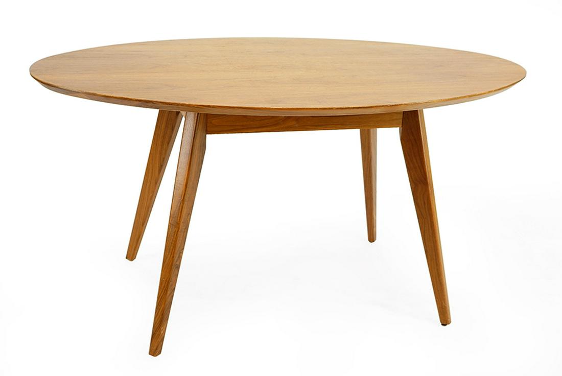 A Knoll Elliptical Table.: A Knoll Elliptical Table. Oval top table raised on four splayed legs 29" x 56.5" x 33.5"