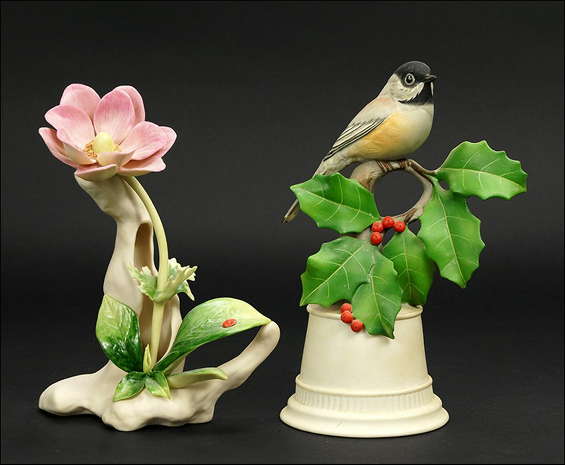 A Boehm Porcelain Black-Capped Chickadee.: A Boehm Porcelain Black-Capped Chickadee. Together with a Cybis porcelain flower (8" x 6" x 3") Boehm height: 8.5"