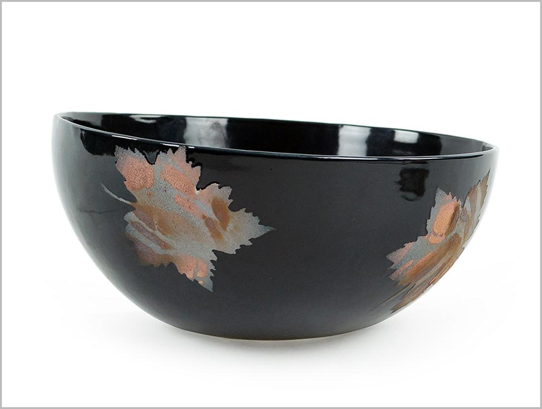 A Buccellati Glazed Ceramic Bowl.: A Buccellati Glazed Ceramic Bowl. Exterior of bowl is decorated with four Raku style pottery leaves 4" x 9"