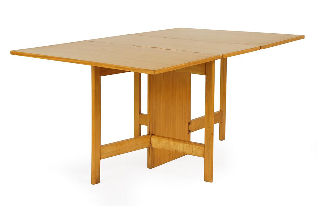 A George Nelson for Herman Miller Gateleg Dining Table.: A George Nelson for Herman Miller Gateleg Dining Table. Bleached mahogany table labeled on the underside "George Nelson Design Herman Miller Zeeland Michigan" Leaves up: 30" x 40" x 64.5" Leaves down:
