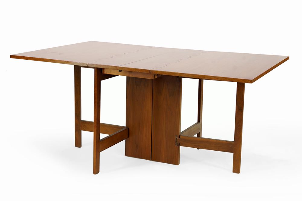 A George Nelson & Associates Gateleg Dining Table.: A George Nelson & Associates Gateleg Dining Table. Drop leaf table with removable central leaf (24" x 40"). Originally purchased 1957, with Herman Miller labels Drop leaves up: 29.5" x 64.5" x 40", Le