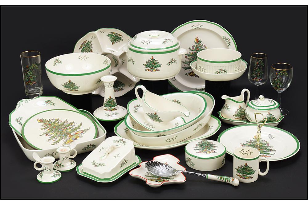 A Collection Of Spode Earthenware Christmas Tree Dishes: A Collection Of Spode Earthenware Christmas Tree Dishes. Comprising eight coffee cups, a pair of candlesticks, a single candlestick, a creamer and covered sugar bowl, a gravy boat, a cookie plate, thr