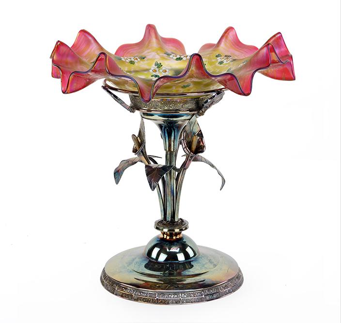 A Loetz Oil Spot Bride: A Loetz Oil Spot Bride's Bowl / Centerpiece. Art glass bowl with enameled flower decoration, raised on a silverplate base Overall: 12.25" x 11.5"