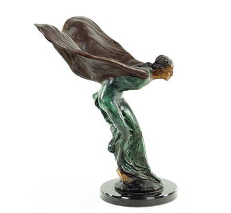 After Charles Robinson Sykes (British, 1875-1950): After Charles Robinson Sykes (British, 1875-1950) Spirit of Ecstasy. Patinated metal figure, signed along the base. Raised on a round 1" marble plinth Figure height: 19"