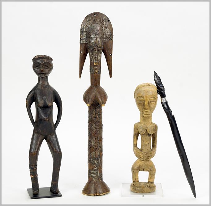 Three Carved Wood African Figures. (1 of 1)