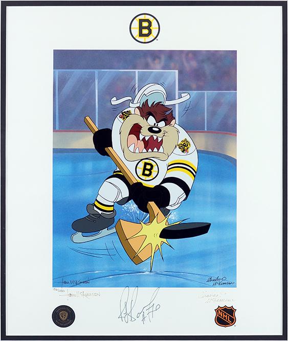 A Warner Bros. / Boston Bruins Autographed Print.: A Warner Bros. / Boston Bruins Autographed Print. Serigraph autographed by Bruins Hall of Famer Ray Bourque as well as Warner Bros. animators Tom and Charles McKimson, numbered 156/250 Frame: 27.75" x