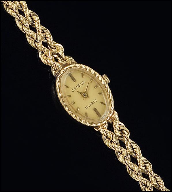 A Geneva 14 Karat Yellow Gold Watch. (1 of 1)