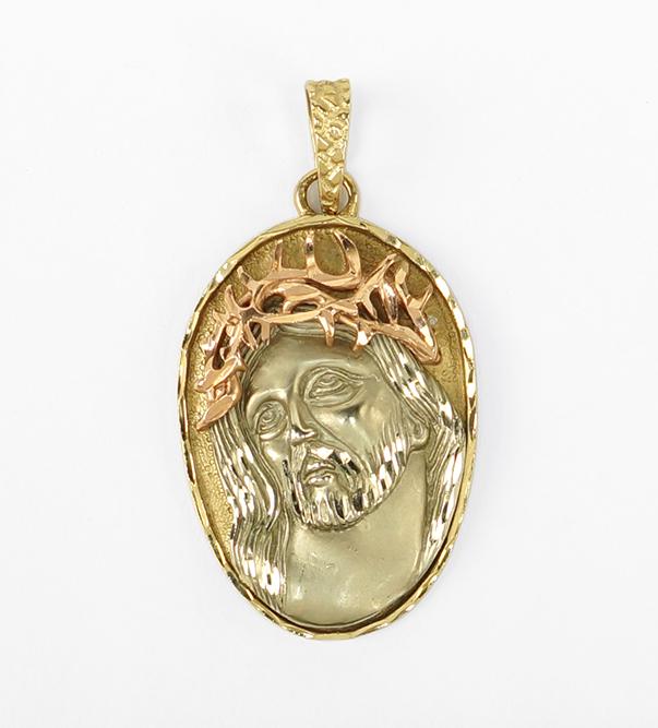 A A 14 Karat Tri-Color Gold Pendant of Jesus Christ.: A A 14 Karat Tri-Color Gold Pendant of Jesus Christ. Wt: 9.6 grams