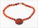 A Chinese Amber Necklace.