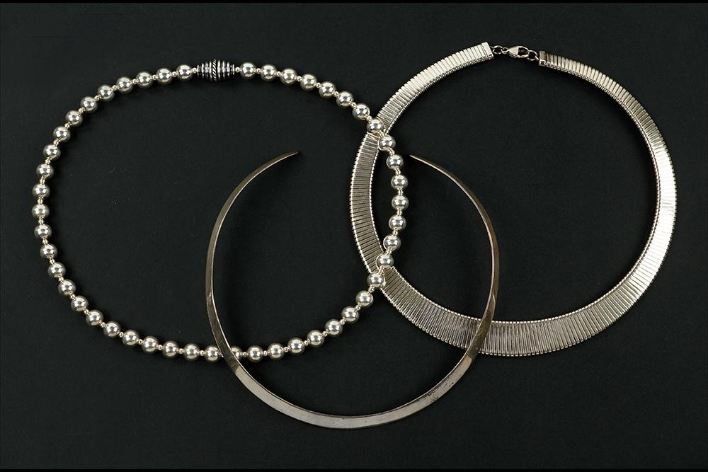 A Nilsson Sterling Silver Collar Necklace.: A Nilsson Sterling Silver Collar Necklace. Together with a sterling silver bead necklace and a graduated sterling silver necklace
