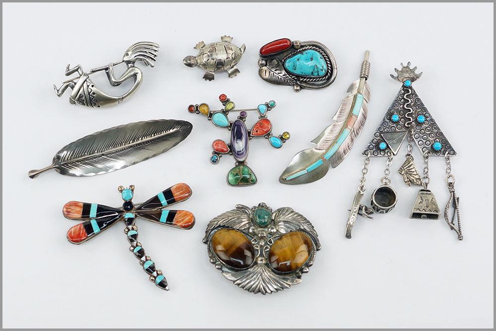 A Collection of Sterling Silver Brooches. (1 of 1)