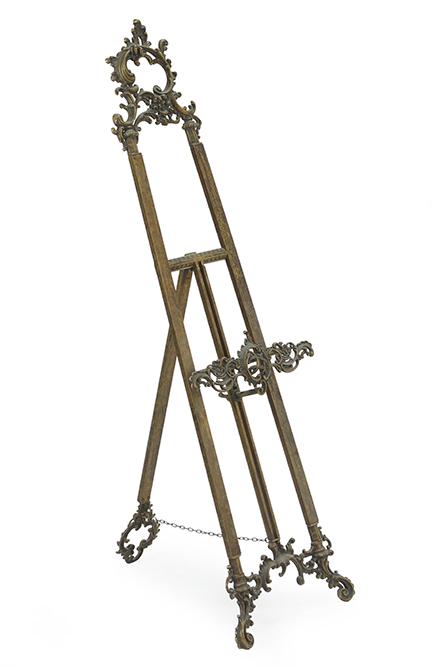 A Rococo Style Metal Easel.: A Rococo Style Metal Easel. Height: 56"