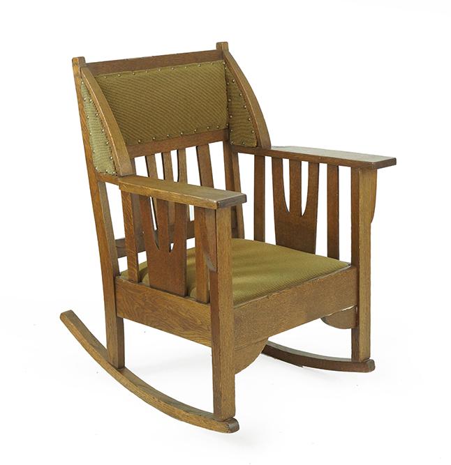 An Arts & Crafts Oak Rocker.: An Arts & Crafts Oak Rocker. Back height: 35"