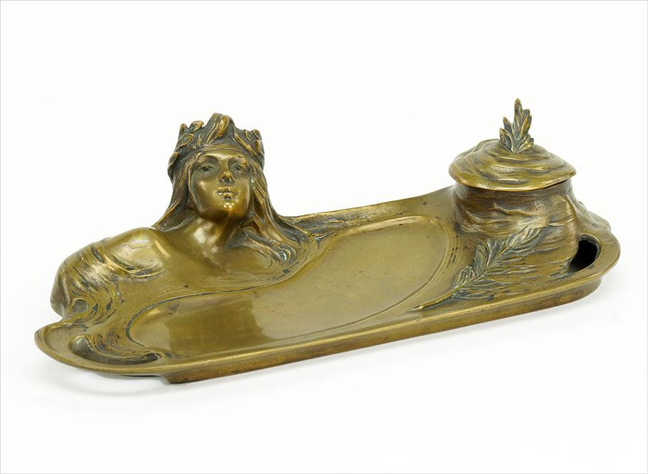 George Flamand (French, 1895-1925) An Inkwell.: George Flamand (French, 1895-1925) An Inkwell. Art Nouveau gilt bronze inkwell, signed along the reverse. Lacking original glass liner 3.5" x 12" x 4.5"