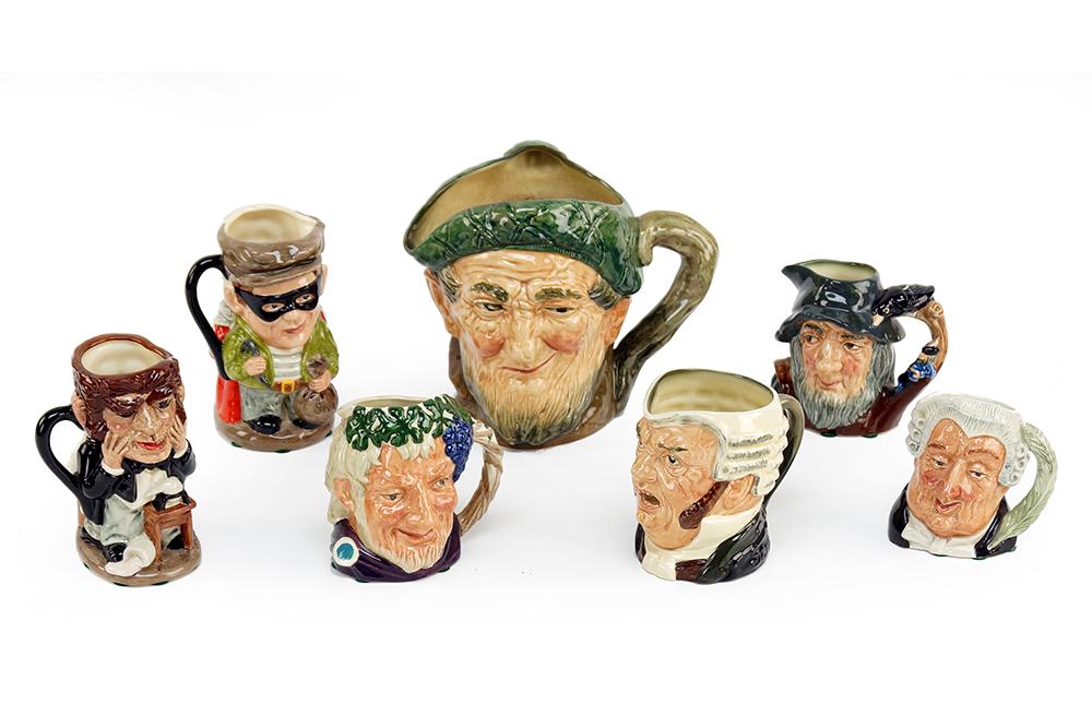 A Collection of Royal Doulton Toby Jugs.: A Collection of Royal Doulton Toby Jugs. Comprising Auld Mac, Dr. Jekyll and Mr Hyde D7024, Bacchus D5505, The Lawyer D6504, Rip Van Winkle D6463, Sargt Buzfuz. The Judge and Thief D6988
