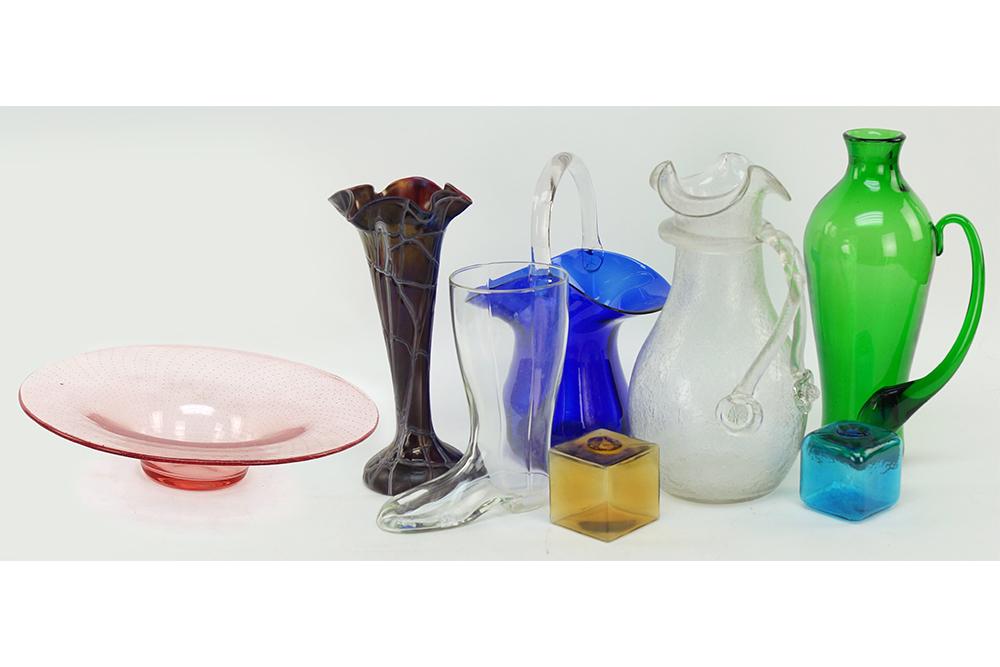 A Collection of Glass.: A Collection of Glass. Comprising a Czech clear glass pitcher, a green glass handled vase, a cobalt glass basket, a clear glass boot, two glass cubes, a pink glass console bowl and an unsigned iridesc